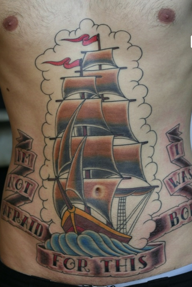 Tattoos - Rhys Gordon - Ship tattoo with script